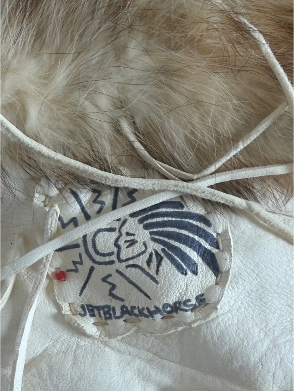 Handcrafted White Leather and Fur Moccasin Boots with Beaded Design